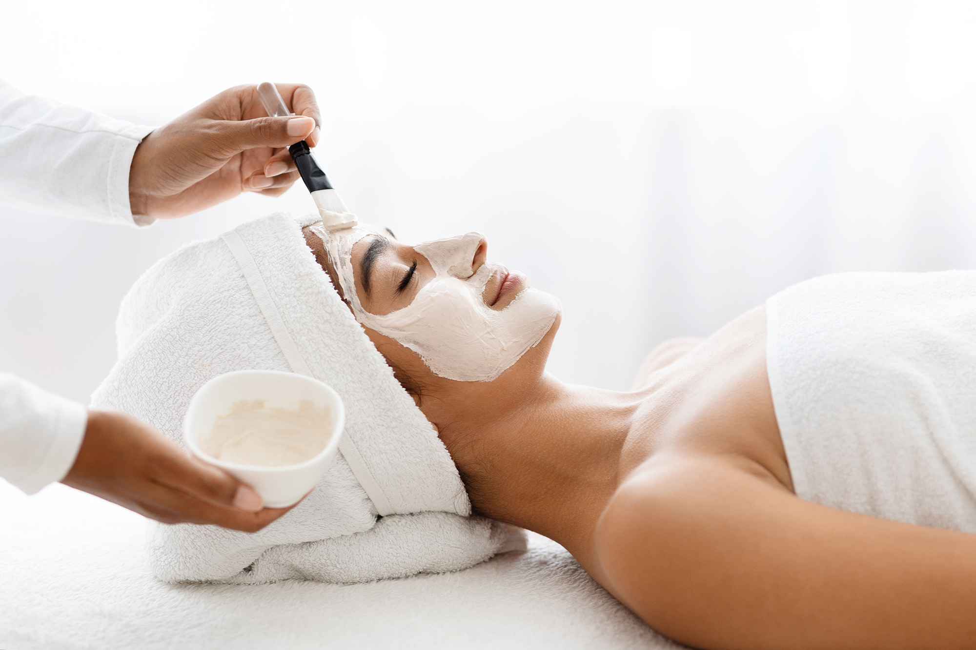 Person getting a beauty treatment.